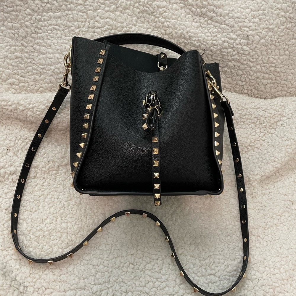 Black studded shoulder bag